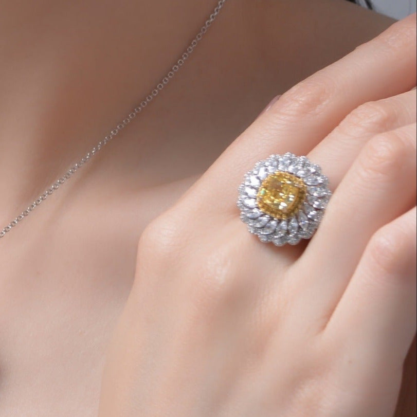 Discover our 6-carat Cushion-cut Daisy Flower diamond ring, featuring a stunning halo design. Perfect for weddings, anniversaries, and special moments.