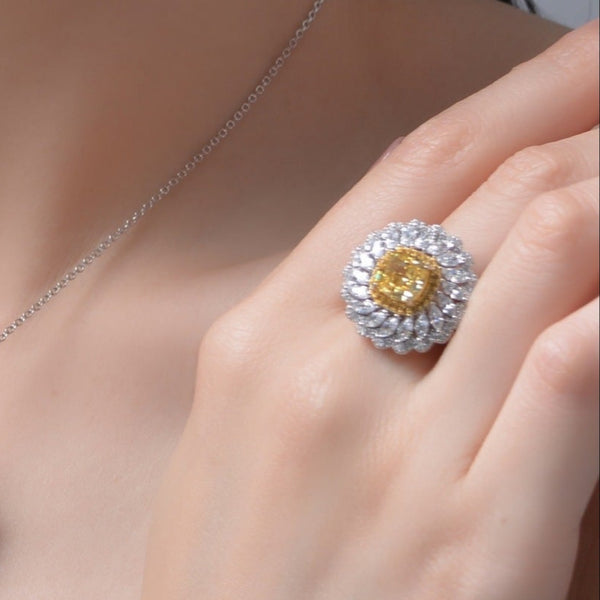 Discover our 6-carat Cushion-cut Daisy Flower diamond ring, featuring a stunning halo design. Perfect for weddings, anniversaries, and special moments.