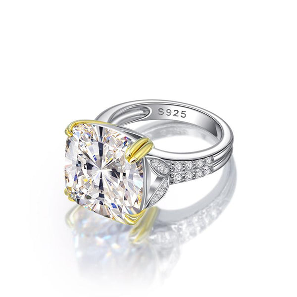 12-carat cushion-cut D color diamond ring with a solitaire halo design, ideal for luxury engagement and timeless elegance.