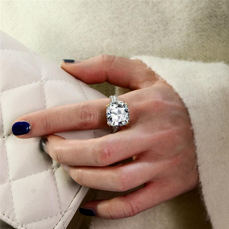 12-carat cushion-cut D color diamond ring with a solitaire halo design, ideal for luxury engagement and timeless elegance.