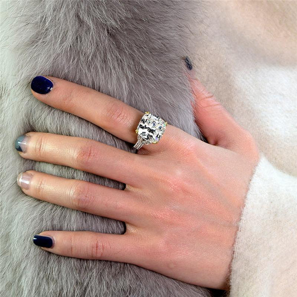 12-carat cushion-cut D color diamond ring with a solitaire halo design, ideal for luxury engagement and timeless elegance.