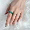 12 Carat Eternity Vivid Green Emerald Simulant Ring | Best Wedding Ring. A minimalist eternity design perfect for luxurious engagements.
