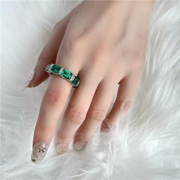 12 Carat Eternity Vivid Green Emerald Simulant Ring | Best Wedding Ring. A minimalist eternity design perfect for luxurious engagements.