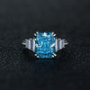 2.5 Carat Rectangular-Cut Ocean-Blue Aquamarine Ring with Step-Cut Diamonds and White Gold Band, Modern Statement Jewelry Design