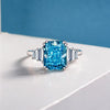 2.5 Carat Rectangular-Cut Ocean-Blue Aquamarine Ring with Step-Cut Diamonds and White Gold Band, Modern Statement Jewelry Design