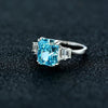 2.5 Carat Rectangular-Cut Ocean-Blue Aquamarine Ring with Step-Cut Diamonds and White Gold Band, Modern Statement Jewelry Design
