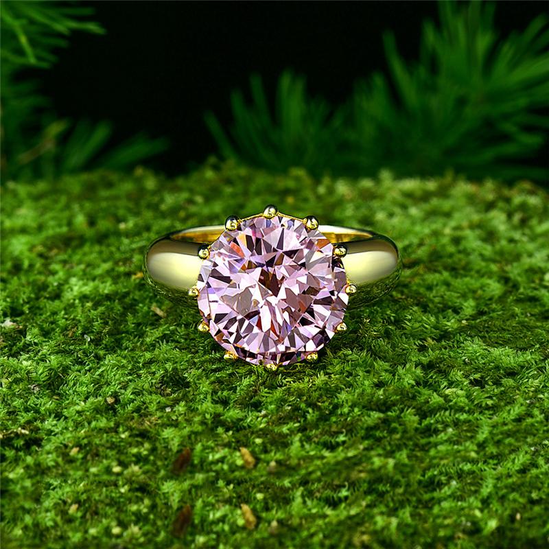 2-carat brilliant round vivid pink simulated diamond solitaire ring with minimalist design, ideal for luxury engagements and timeless elegance.