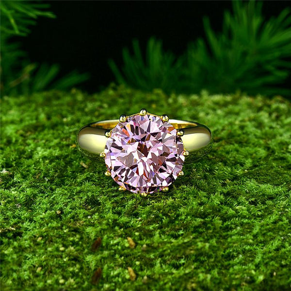 2-carat brilliant round vivid pink simulated diamond solitaire ring with minimalist design, ideal for luxury engagements and timeless elegance.