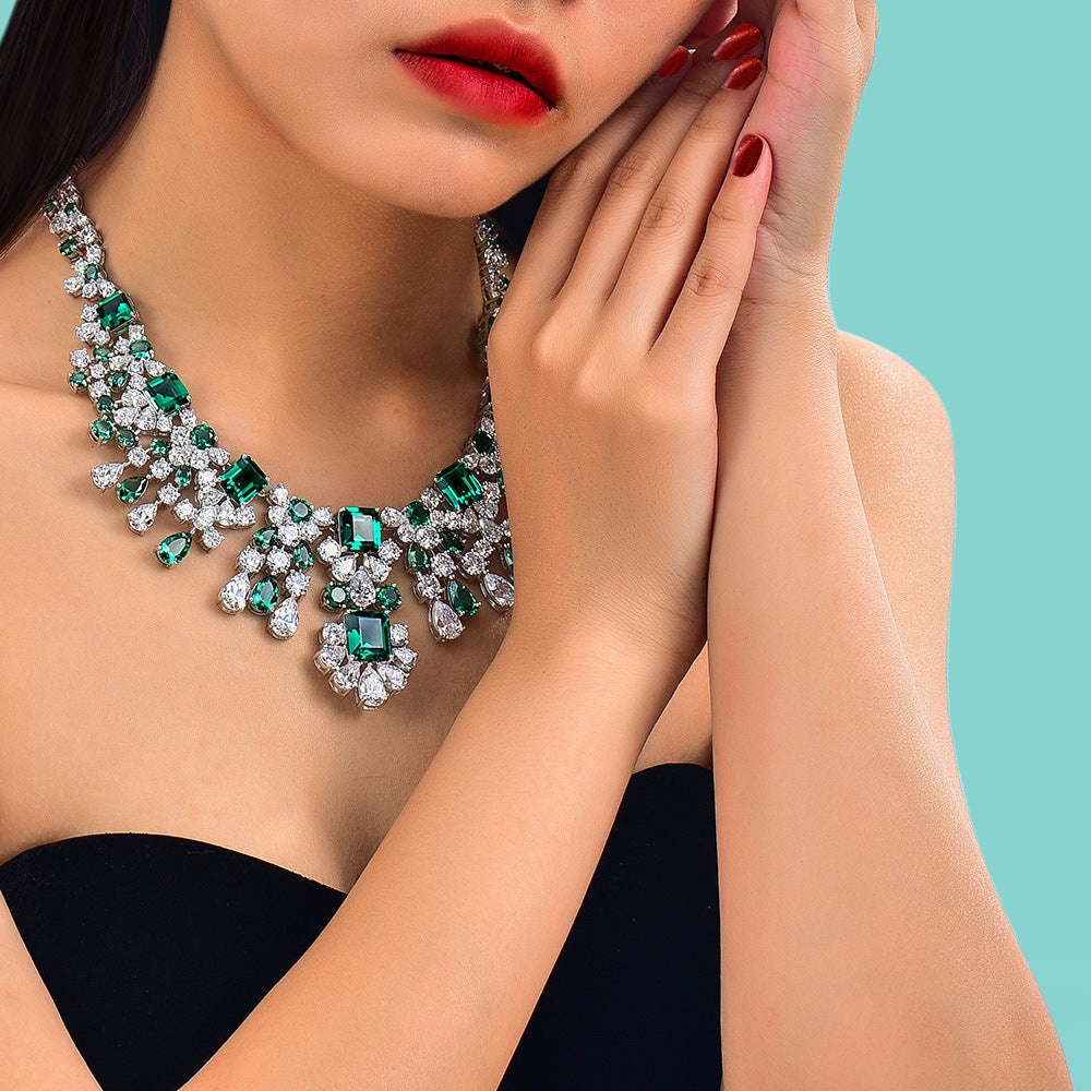 300+carat vivid green emerald necklace in 925 silver with elegant queen-style design.