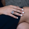3-carat emerald-cut D-color diamond three-stone ring, luxury wedding or engagement jewelry with timeless elegance.
