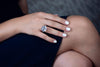 3-carat emerald-cut D-color diamond three-stone ring, luxury wedding or engagement jewelry with timeless elegance.