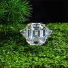 3-carat emerald-cut D-color diamond three-stone ring, luxury wedding or engagement jewelry with timeless elegance.