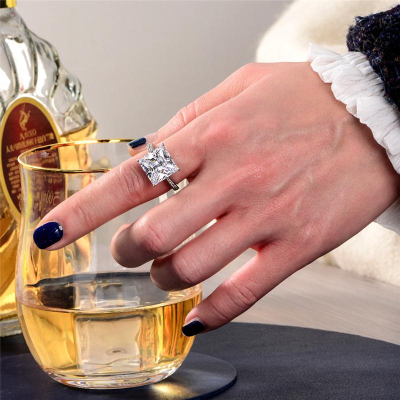 3-carat princess cut D-color diamond solitaire engagement ring with luxurious design, perfect for timeless elegance and special moments.