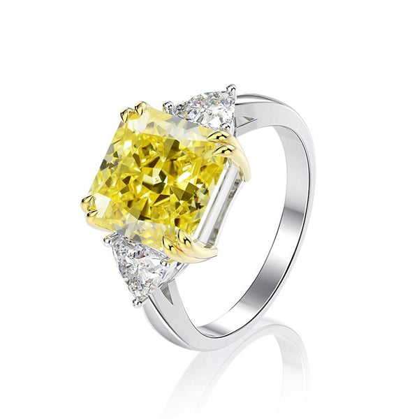4-carat brilliant princess cut canary yellow diamond ring with three-stone halo design, ideal for weddings and luxury engagements.