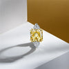 4-carat brilliant princess cut canary yellow diamond ring with three-stone halo design, ideal for weddings and luxury engagements.