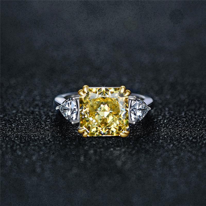4-carat brilliant princess cut canary yellow diamond ring with three-stone halo design, ideal for weddings and luxury engagements.