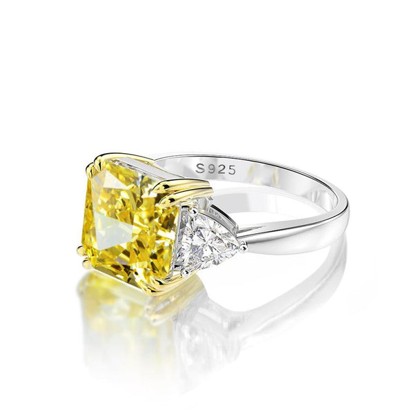 4-carat brilliant princess cut canary yellow diamond ring with three-stone halo design, ideal for weddings and luxury engagements.