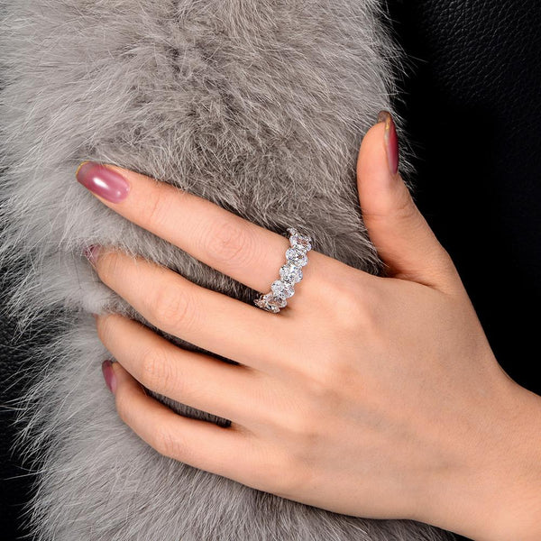4-carat brilliant Oval Cut D color Lab-Grown diamond eternity ring. A minimalist eternity design perfect for luxurious engagements.