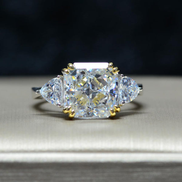 4-carat brilliant princess cut D color diamond ring with three-stone halo design, ideal for weddings and luxury engagements.