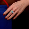 5.0 Carat Cushion-Cut Ocean-Blue Aquamarine Ring with Pink and Yellow Diamonds in a Three Stone Design on White Gold Band