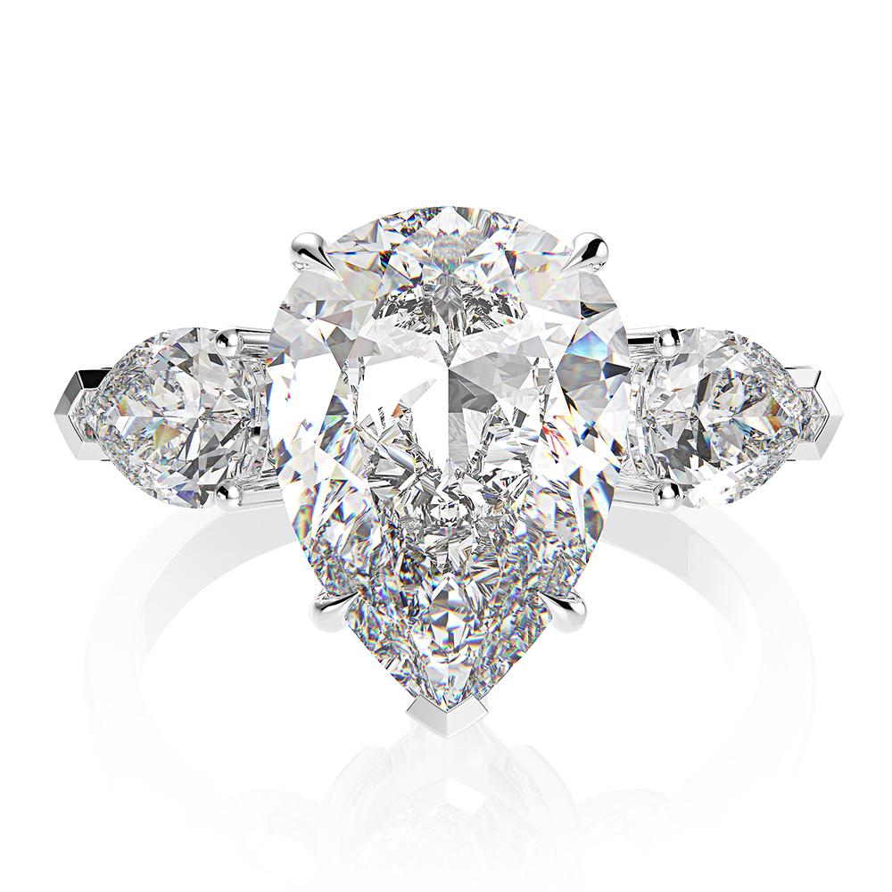 6-carat D color brilliant pear-cut diamond ring with a three-stone design, perfect for weddings and engagements, crafted for ultimate luxury.