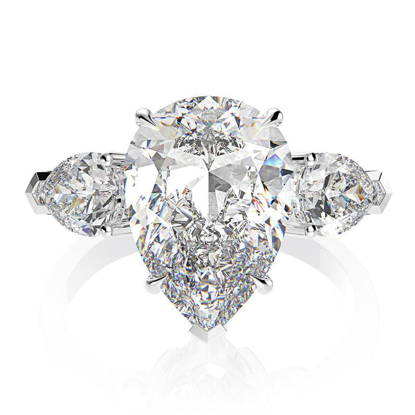 6-carat D color brilliant pear-cut diamond ring with a three-stone design, perfect for weddings and engagements, crafted for ultimate luxury.