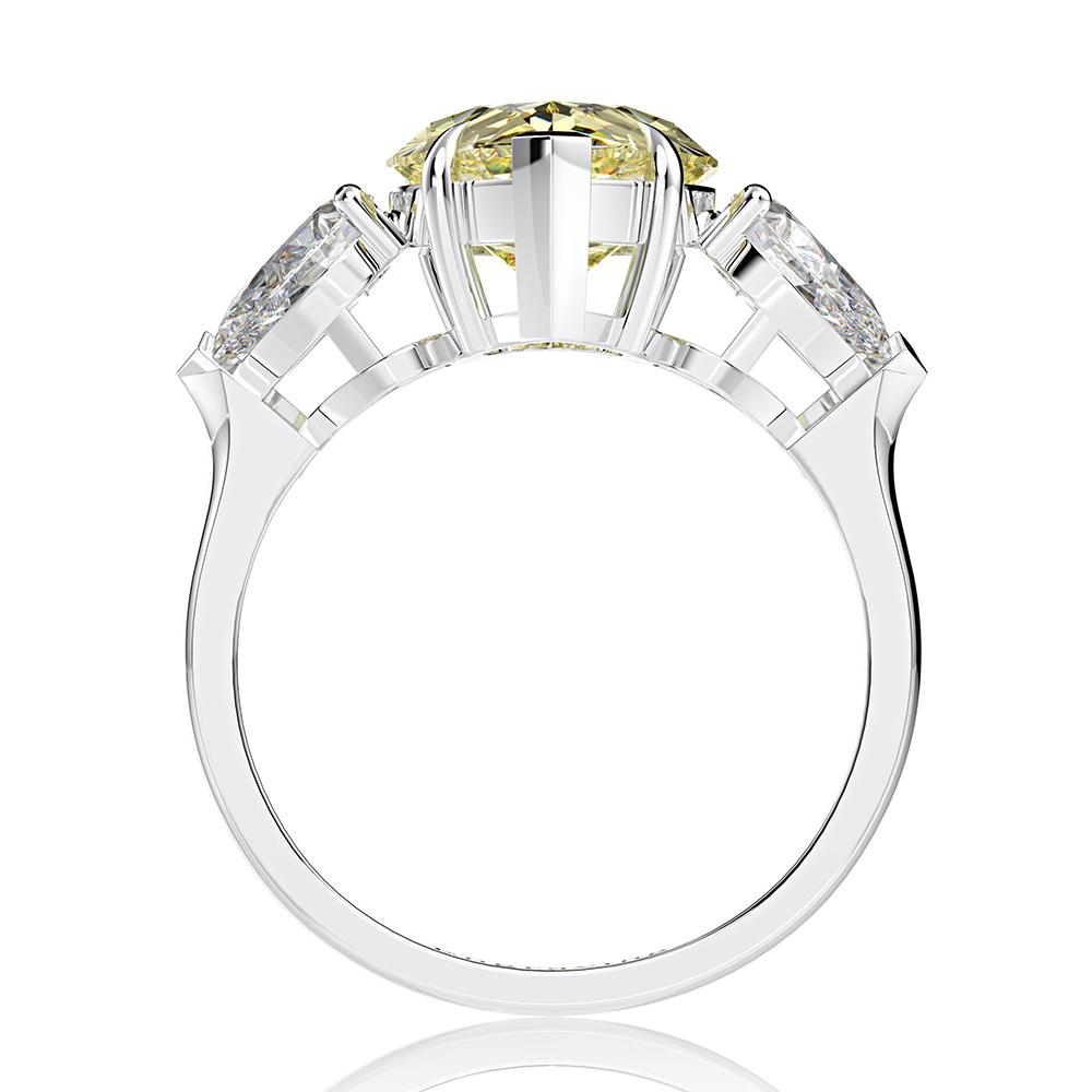6-carat D color brilliant pear-cut diamond ring with a three-stone design, perfect for weddings and engagements, crafted for ultimate luxury.