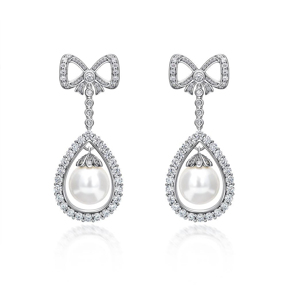 Long Tassel Love Bow Style Mother of Pearl Dangle Earring w Luxurious Design