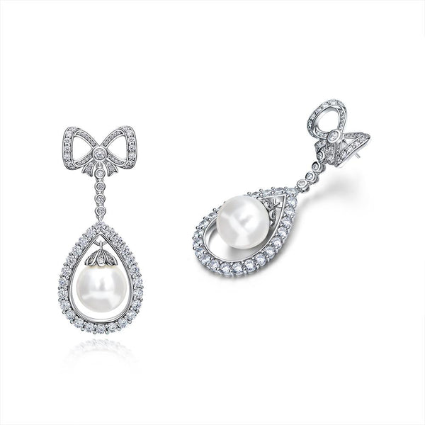 Long Tassel Love Bow Style Mother of Pearl Dangle Earring w Luxurious Design