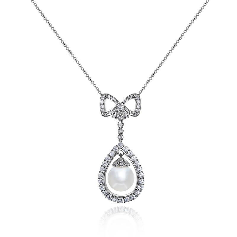 Long Tassel Love Bow Style Mother of Pearl Dangle Pendant w Luxurious Design